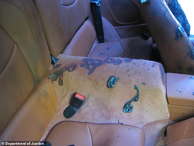 The vehicle's interior was charred and burnt and the red leather on the driver's seat was melted away