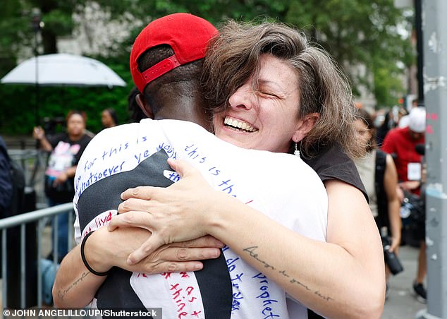 Elated Diddy fans celebrate outside the courthouse on Wednesday as he's found not guilty of the most serious charges, but guilty of some