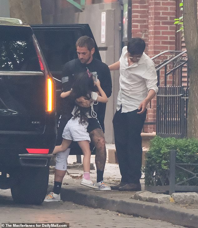 Cassie Ventura's partner Alex Fine is seen with their kids in New York on the day the Combs verdict was announced