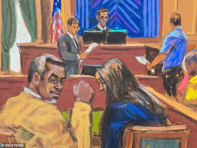 The rapper (left) looks back at the court and gives a fist bump as the verdict is read aloud