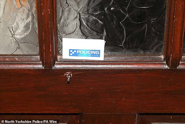 At his trial, Carr said he never intended to kill his wife but that if he had wanted to kill her he would have been able to with his skills as an archer (Pictured: a bolt through Carr's wooden front door)