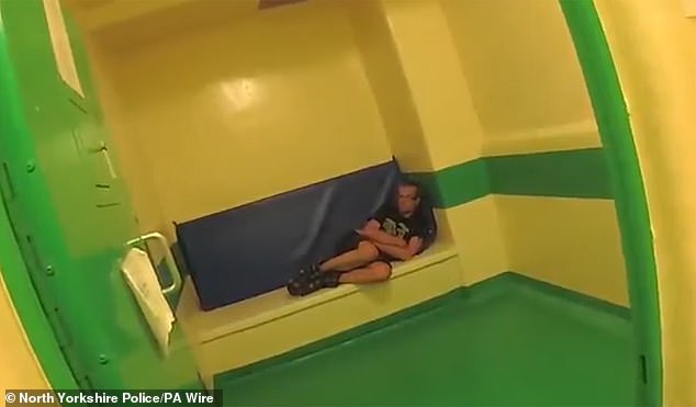 The jury found Carr guilty of attempted murder and he was sentenced at Leeds Crown Court to 17 years in prison on Wednesday and an additional three years on licence following his release (Pictured: Carr in custody after his frenzied attack on his wife)