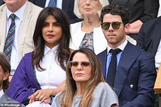 Nick took his place next to his wife, Priyanka Chopra, when watching the live action on day three of Wimbledon