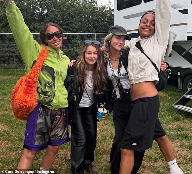 The couple (centre), who have been together since 2022, were among the celebrities who turned out for the star-studded festival at Worthy Farm
