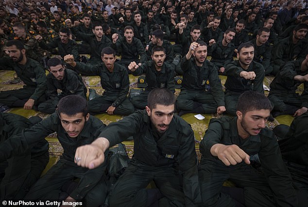 Pictured: Islamic Revolutionary Guard Corps military personnel shout anti-U.S. and anti-Israeli slogans during a Friday prayers ceremony at the University of Tehran