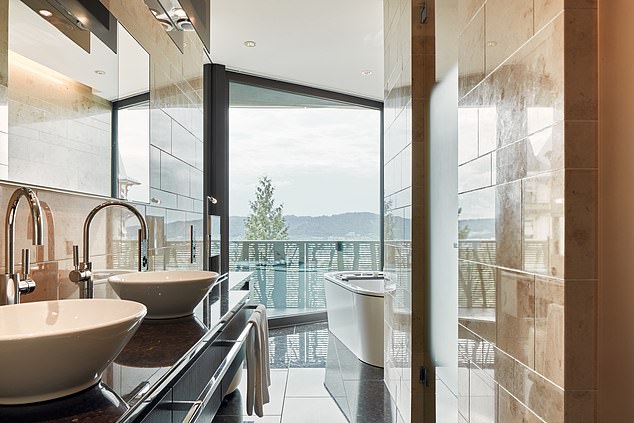 The squad will spend much of their downtime between matches at the historic Swiss hotel (Pictured: a bathroom in the property)