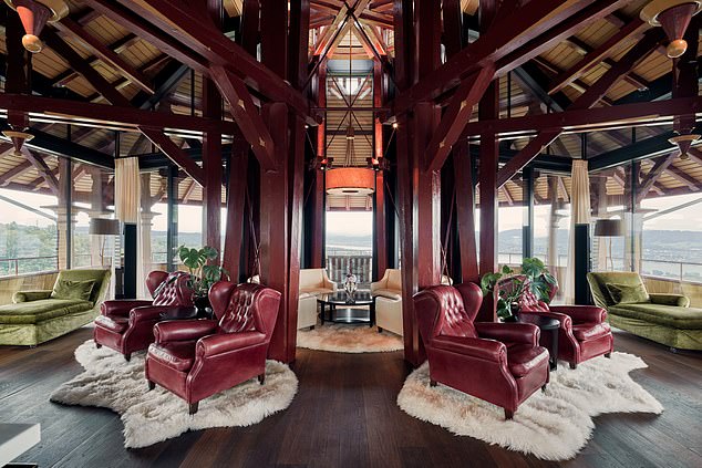 The five-star hotel, where rooms cost around £640 a night, overlooks Lake Zurich
