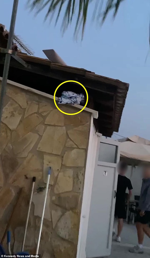 Screen grab shows a towel that was hidden by British summer workers in Zante who say they are fed up with tourists trying to claim sunbeds