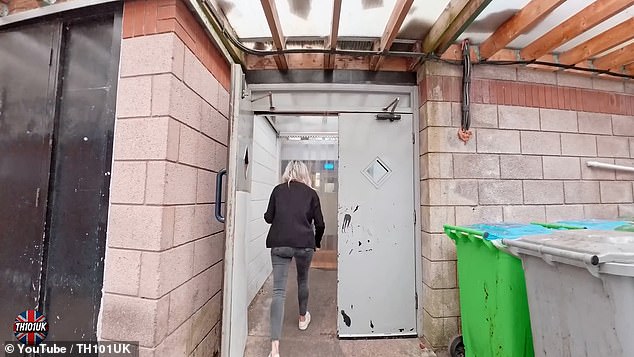 Pictured is one staff member entering the backdoor of the hotel's kitchen