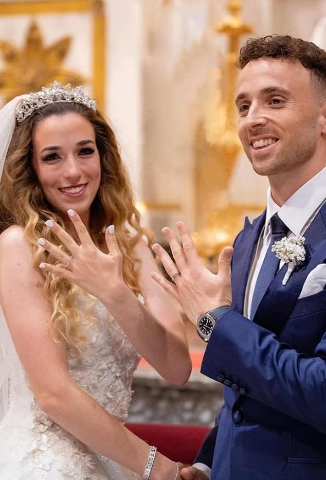 Mr and Mrs Jota show off their rings after exchanging vows