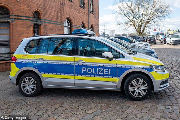 Police were joined at the scene by firefighters and other emergency services in 'large numbers' (File image of a German police car)