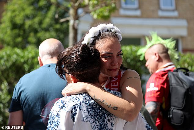 There were emotional scenes at Anfield as fans embraced each other following the death of Jota