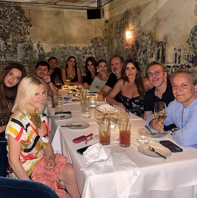 The post also included another photo from a massive group dinner somewhere in Madrid