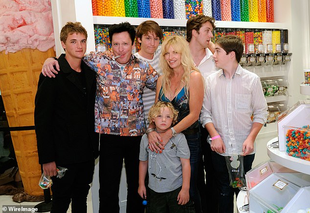Hudson Madsen is pictured with his dad Max Madsen, Luke Madsen, DeAnna Madsen, Christian Madsen and Kalvin Madsen in July 2011