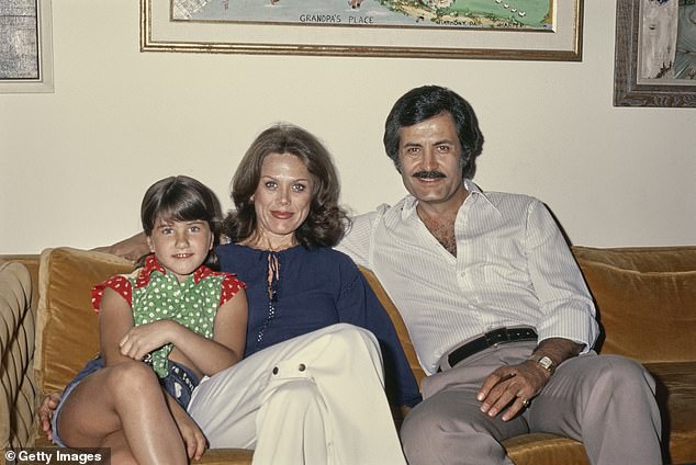 'She loved Jenette's story and is very passionate about bringing it to life. Of course, the book is a topic that Jen and many other daughters of difficult mothers can relate to,' the insider added. Aniston and her parents seen in 1975