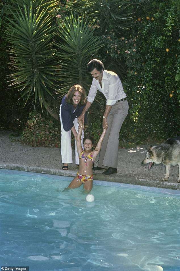 After news broke of the A-lister's casting, a source told the Daily Mail exclusively: 'This is a very poignant role for Jen to say the very least' (Jennifer pictured with her parents in 1975)