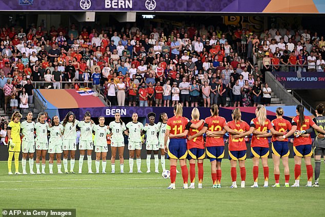 Spain's and Portugal's team players observe a minute of silenceahead of the UEFA Women's Euro 2025 Group B football match