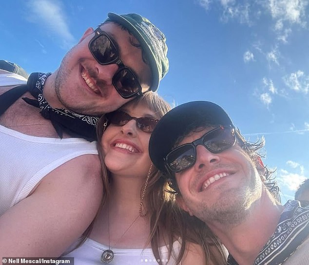 Paul posed with his sister Nell and his lesser-seen brother Donnacha