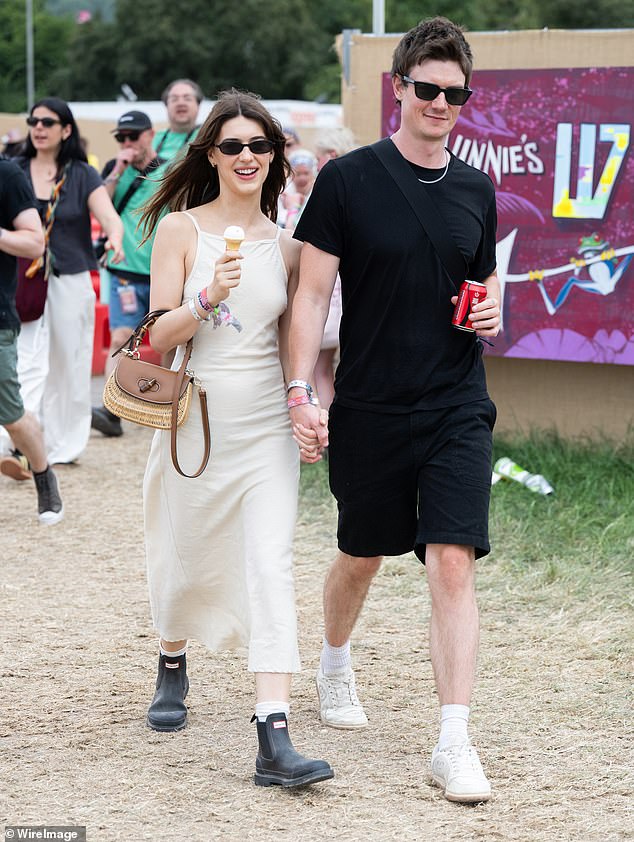 Daisy was not outdone in the romance stakes by her pal Paul, as she was seen with the and self-taught photographer walking hand-in-hand at the popular music event which takes place at Worthy Farm every year