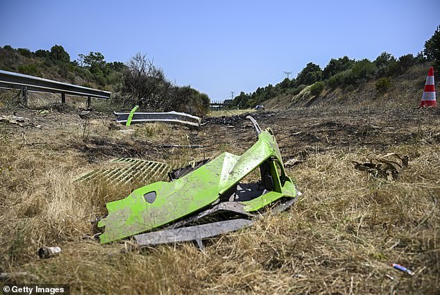 The acid green front of what appears to be the front of the Lamborghini Huracan lies at the side of the road where Diogo Jota and his brother died yesterday. Their family and the world of football are mourning their tragic deaths near the town of Cernadilla, close to Zamora, Spain