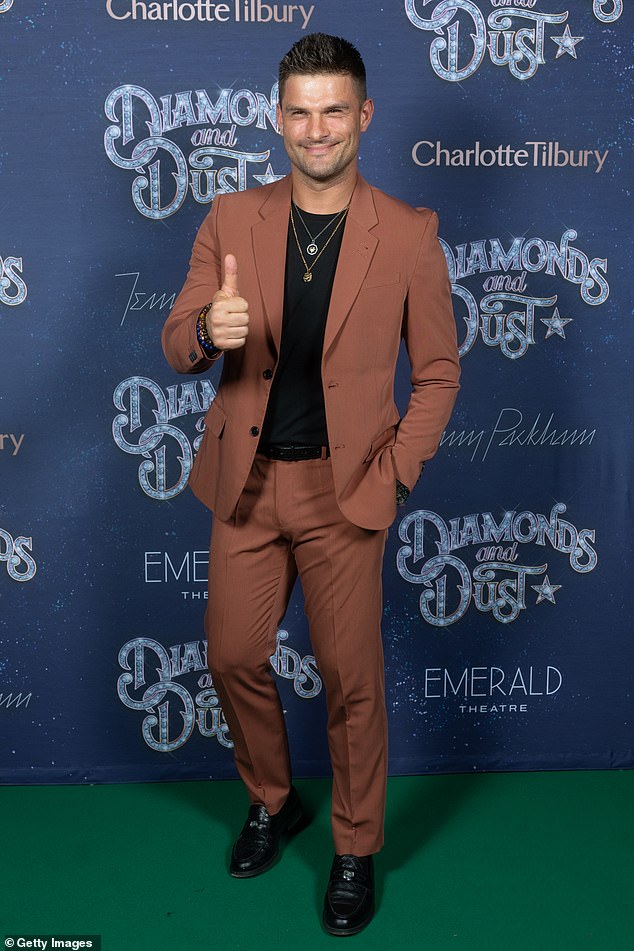 Another Strictly star out in force was Aljaz Skorjanec, who arrived on the carpet in a burgundy suit
