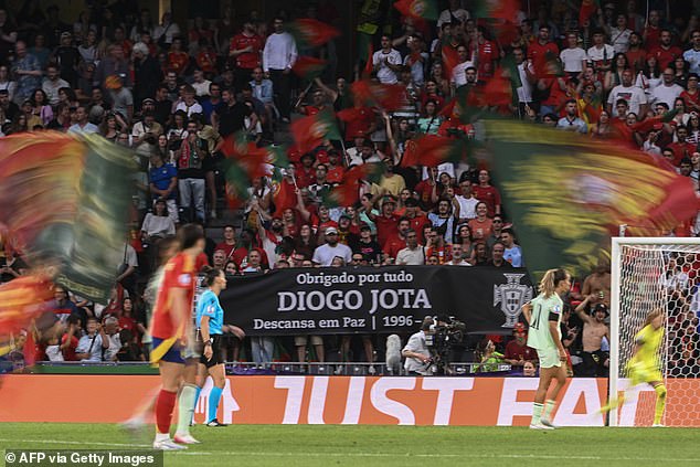 A banner that read 'thank you for everything, rest in peace' in Portuguese was on display in the crowd and players stood with it after the game