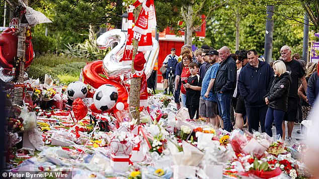 Some fans left balloons as the football world mourned the loss of the Premier League star