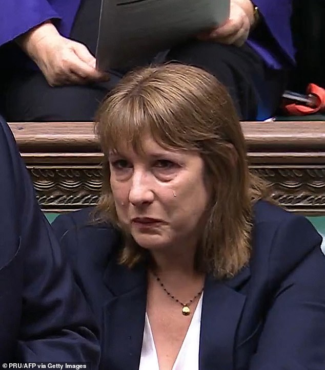 Chancellor Rachel Reeves appears tearful as opposition leader Kemi Badenoch speaks during PMQs