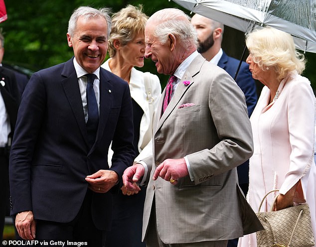 Prime Minister Mark Carney and his wife Diana Fox Carney greet Charles and Camilla as they arrive at the official residence of the Governor General of Canada, Rideau Hall, in Ottawa on May 26, 2025