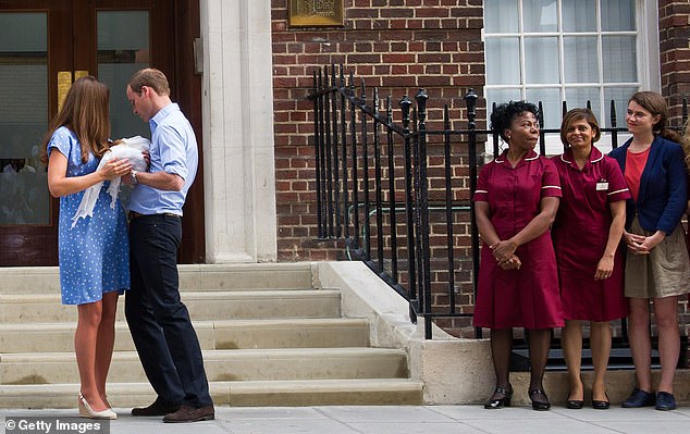 Kate and William pose outside St Mary's Hospital in 2013 while their midwives stand to the side