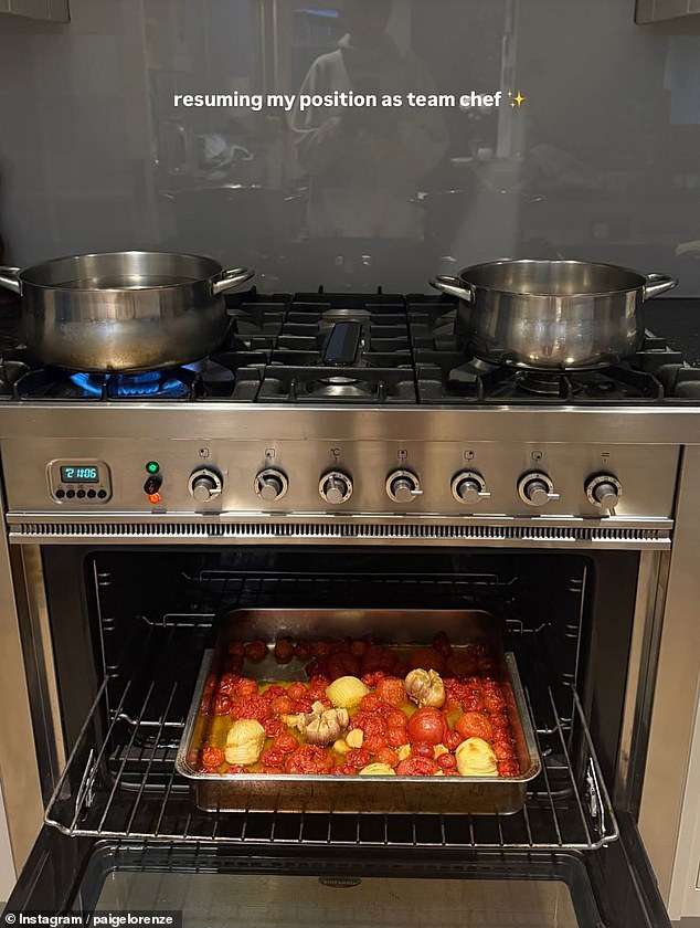 She joked that she was 'resuming my position as team chef,' a couple of days ago on Instagram as she posted pictures of her roasting tomatoes and cheese, seemingly cooking for Tommy and his comrades