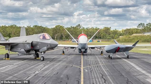 An F-35A Lightning II, MQ-4C Triton and MQ-28A Ghost Bat on the tarmac at RAAF Base Tindal