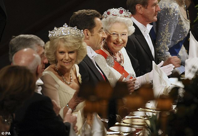 Camilla, Nicolas Sarkozy and Queen Elizabeth II at a state banquet at Windsor Castle in 2008