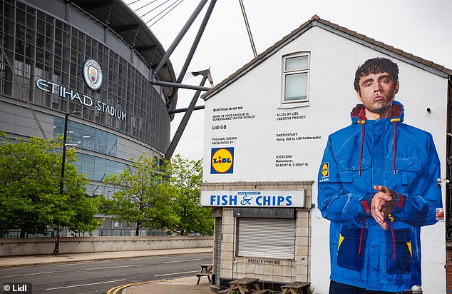 Unveiled via a 30ft wonderwall in the Gallagher boys’ hometown just outside Manchester’s Etihad Stadium the jacket has been created for both Britpop and Lidl fanatics alike