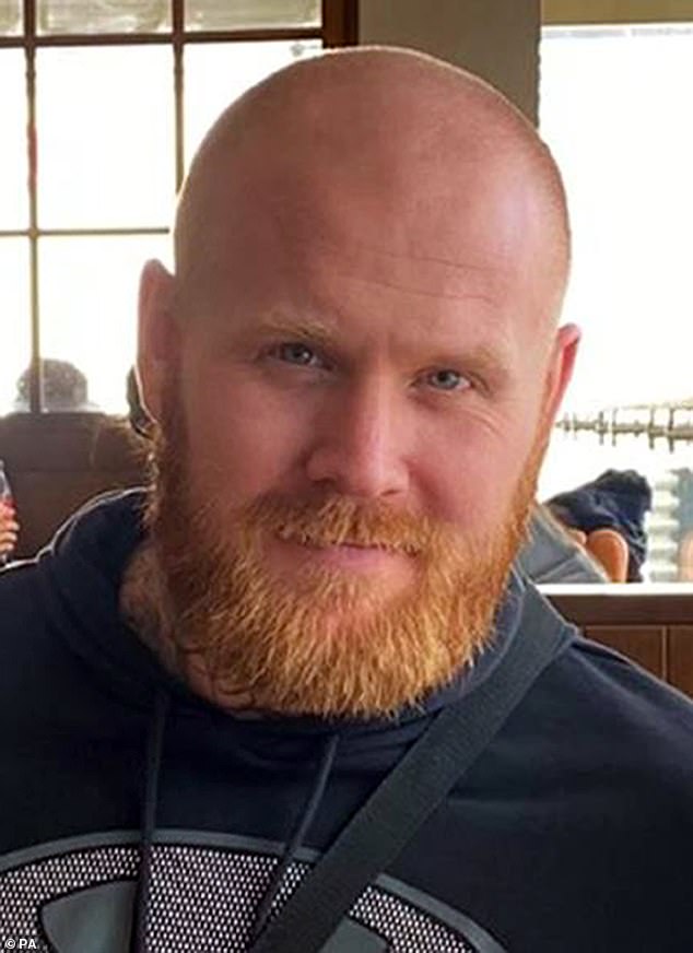 Mr Scott (pictured) had searched inmate Elias Morgan's cell and found a mobile phone on March 26, 2020, Preston Crown Court was told