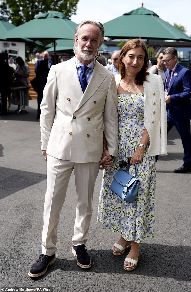 Fellow British culinary hero Marcus Wareing was also seen at the tennis with his wife Jane - who opted for a cream floral frock