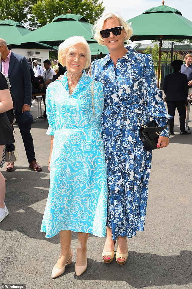 Dame Mary and Annabel were sartorially in sync for the day out, both sporting stylish floral dresses in complementary shades of blue