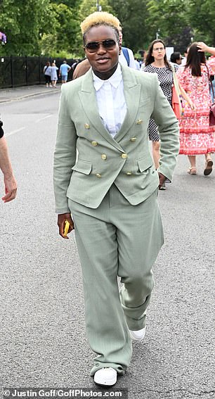 Also looking stylish was former boxer and Strictly star Nicola Adams who opted for a pale green suite with statement gold buttons