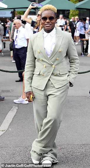 Also looking stylish was former boxer and Strictly star Nicola Adams who opted for a pale green suite with statement gold buttons
