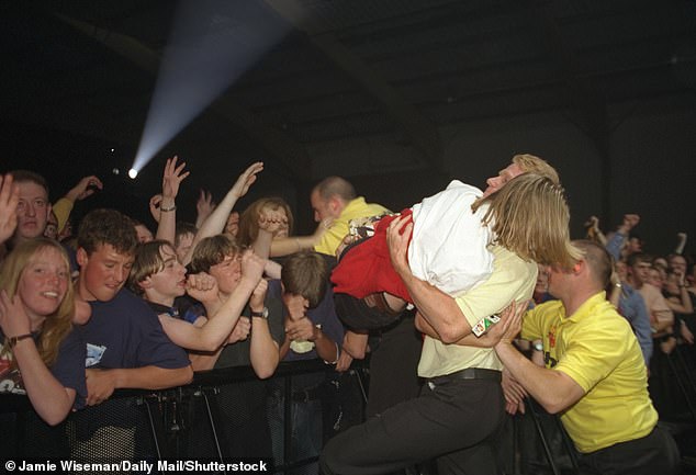 Crowds were put of control at during the second night of their tour for their album Be Here Now in 1997