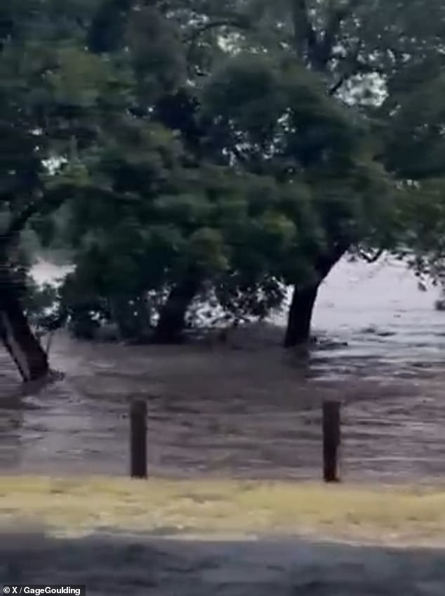 Evacuations are under way for locals living along the river, with authorities warning the of a 'dangerous' and potentially 'life-threatening' floods. Pictured: Kerville, Texas this morning