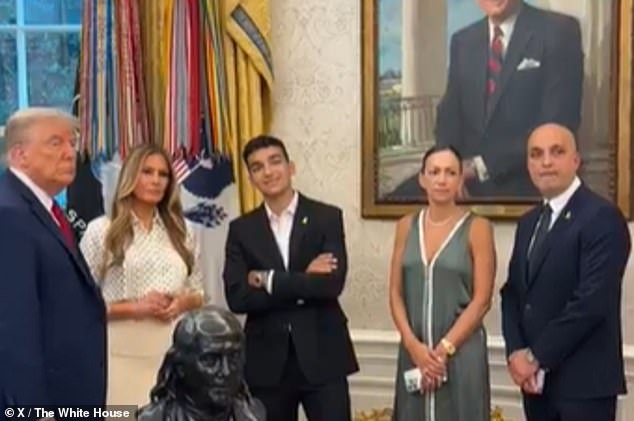 President Donald Trump and first lady Melania Trump met with freed hostage Eden Alexander (center) and his family (right)