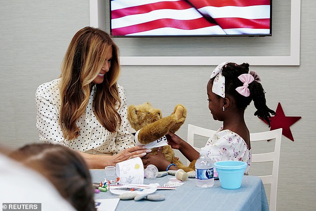 The first lady gifted the kids with blankets and teddy bears bearing 'Be Best' t-shirts