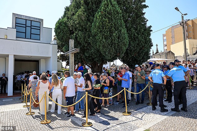 Hundreds of mourners queue to pay their respects to Diogo Jota at the city centre chapel in the Portuguese city of Gondomar