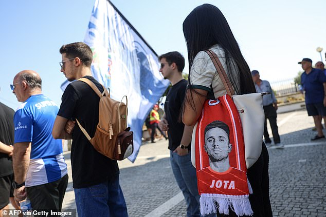 Mourners carried flags and football scarves bearing Diogo Jota's face as they made the pilgrimage to the chapel