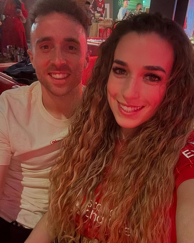 Jota and his wife after Liverpool won the title in May