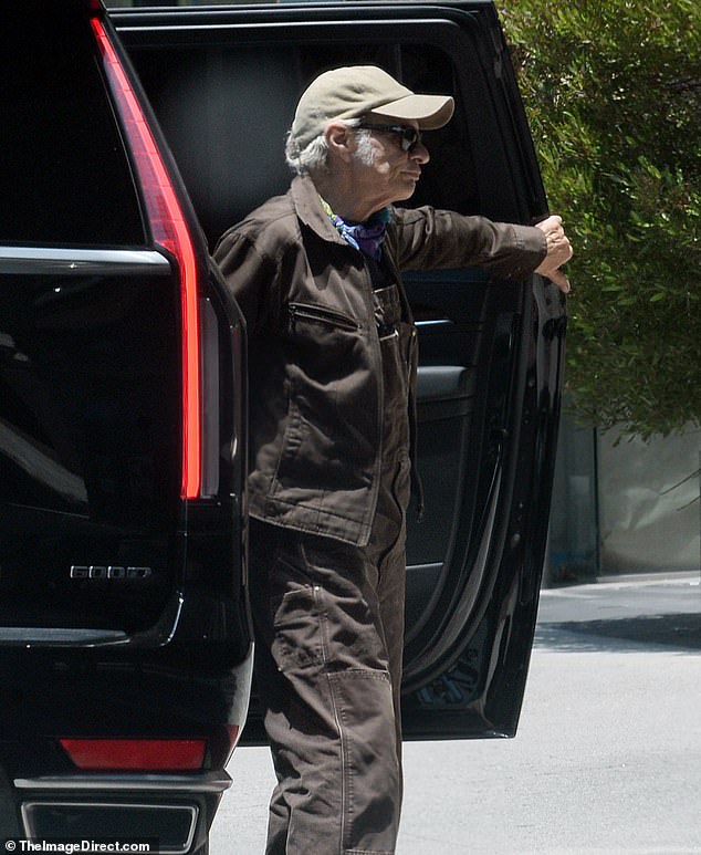 The star was seen stepping out of a sleek black SUV as he enjoyed his solo outing in Los Angeles