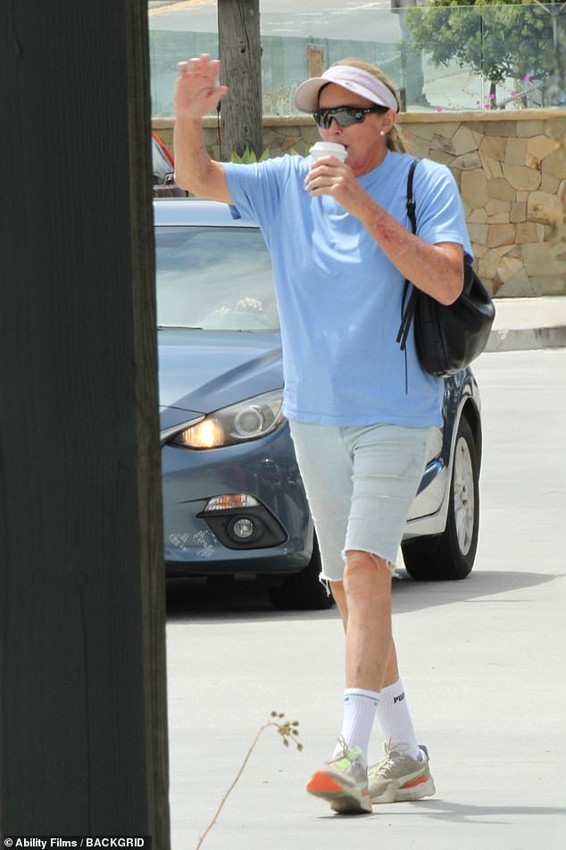 Jenner was seen waving as she grabbed a coffee hours after her tragic loss