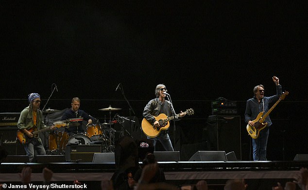 He said: 'So glad to be here with the greatest rock ‘n’ roll band. When I heard Oasis were reforming I thought I was in it!'
