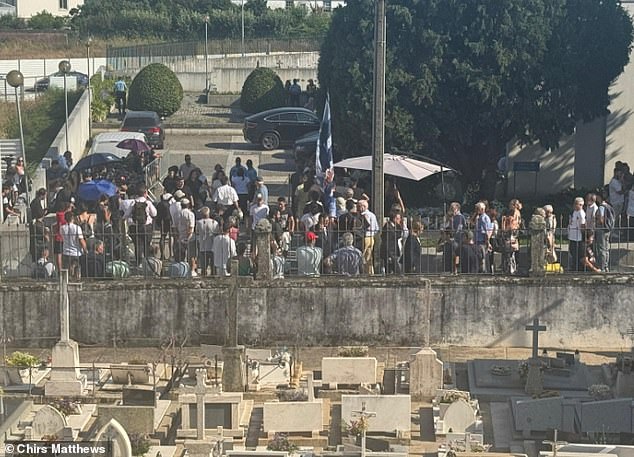 Mourners head out into the streets of Gondomar to pay their respects to the departed national team star